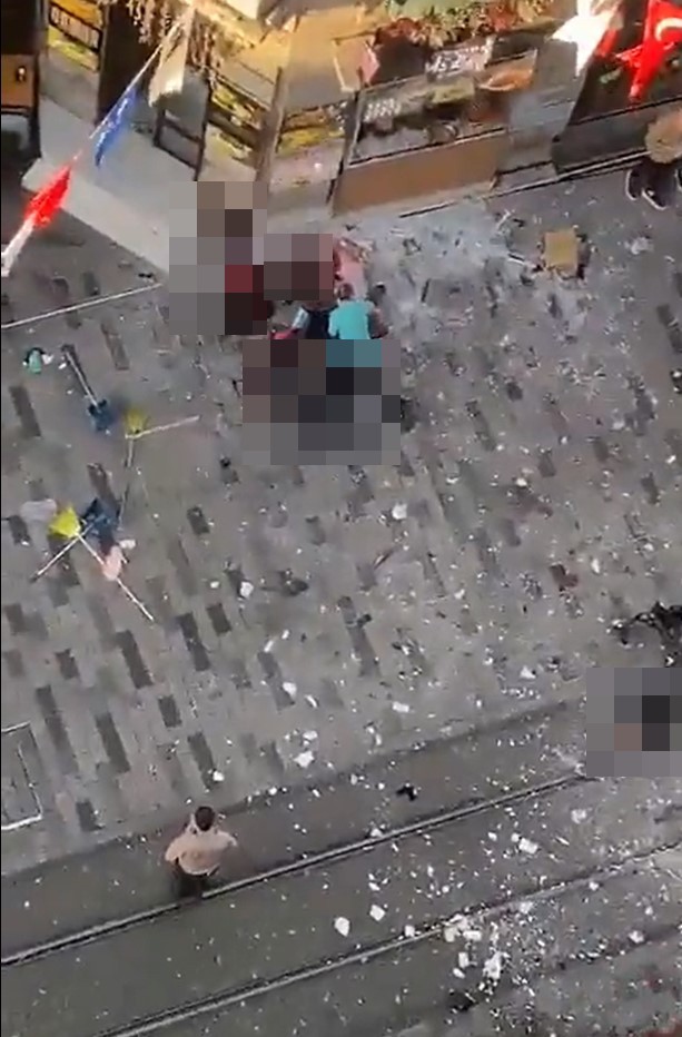 Bodies were seen scattered on the street following the blast