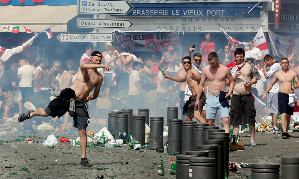 Fans clashing with French cops in Marseille in riots that saw two Brits seriously injured