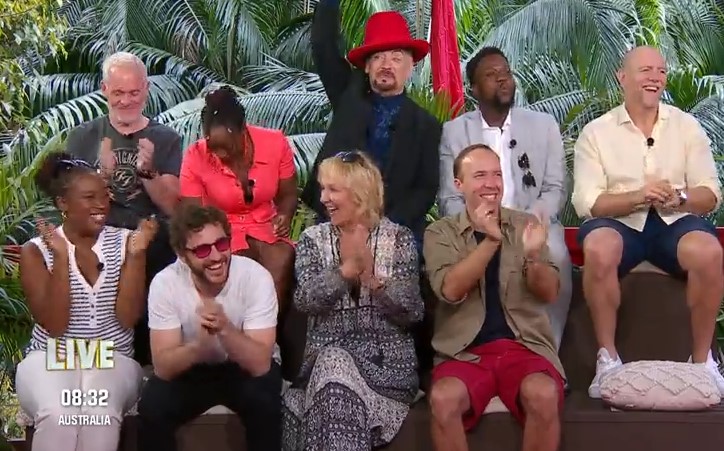George was spotted throwing his drink in the air after Jill's win