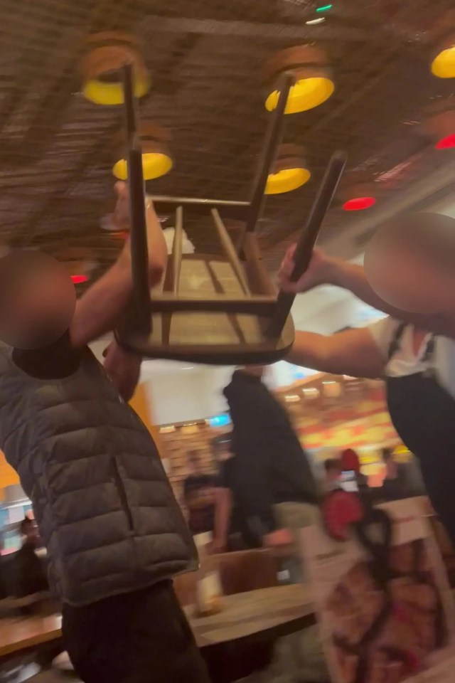 The man eventually let go and the woman continued to 'wield it like a weapon'
