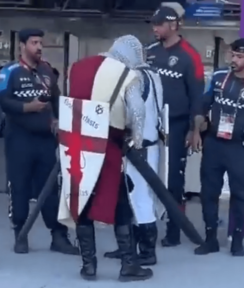 England fans seen confronted by Qatari cops earlier this week
