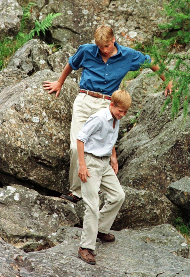 William and Harry play on the banks of the river Muick near Ballater at Balmoral