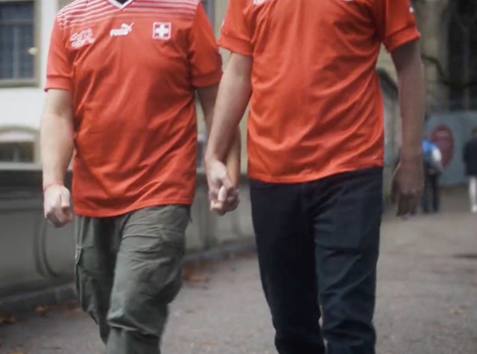 The squad announcement video shows two Switzerland fans holding hands