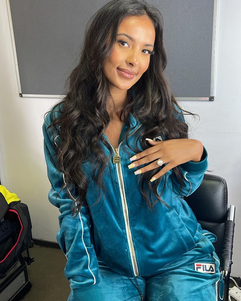 Maya shows off her engagement ring