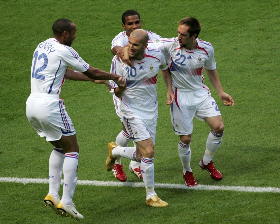 Thierry Henry, Malouda and Franck Ribery congratulate Zidane after his World Cup final goal