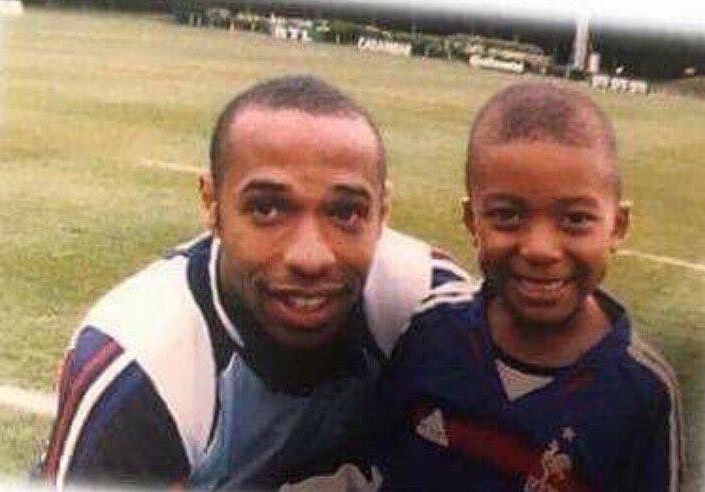 The young Mbappe with childhood hero and French World Cup legend Thierry Henry