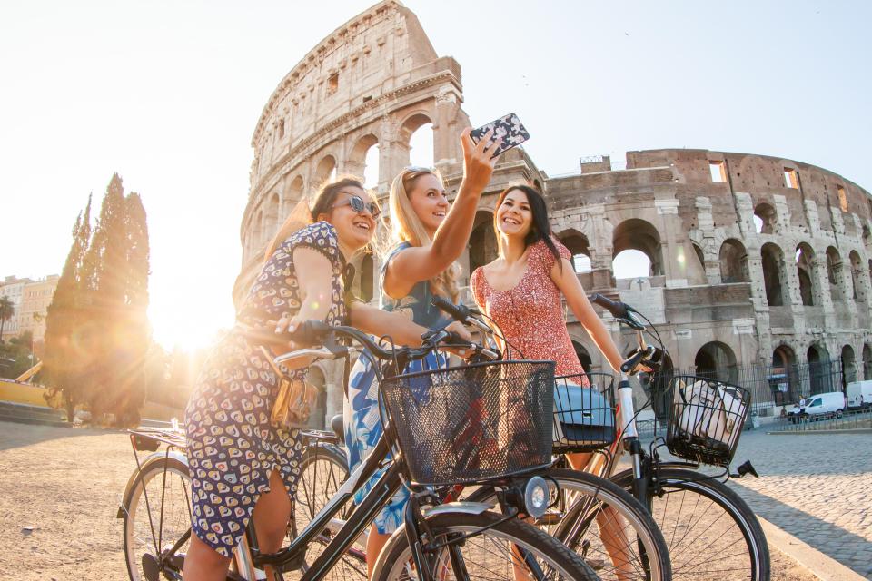 Tourists claim they were forced to pay as much as £430 for pictures outside the Colosseum in Rome (stock image)