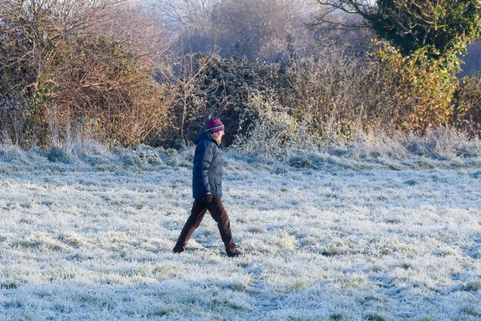 A man braves the cold in Dorset yesterday