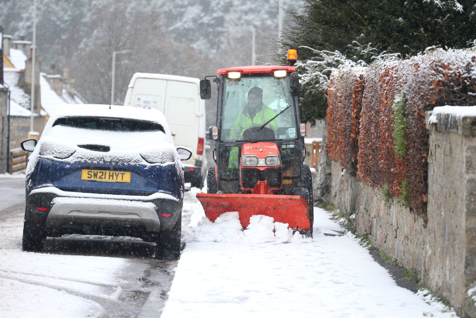 A workman was seen clearing the pavements in Tomintoul