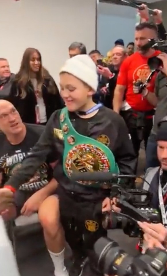 Fury's eldest son, with the WBC belt hanging off his shoulders, shook hands with Chisora