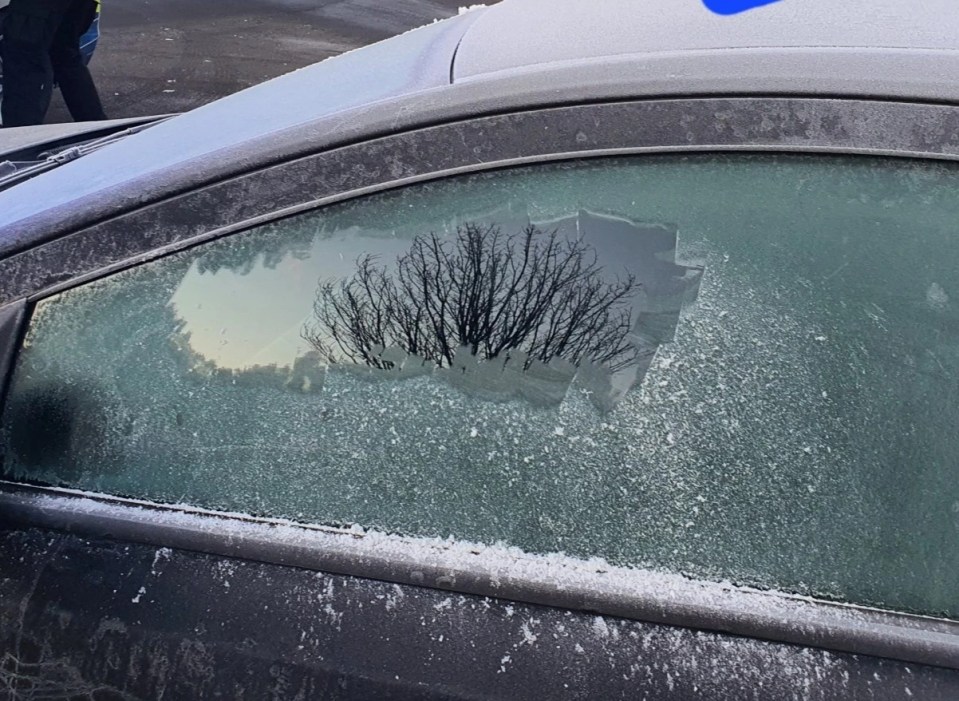 The driver had only cleared a small amount of ice from his side windows