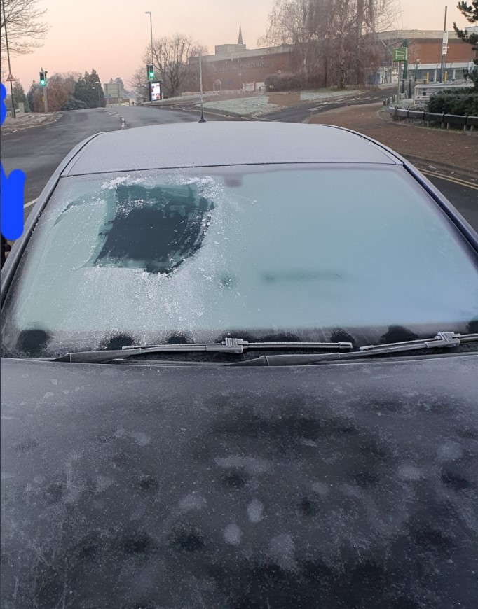 The driver was fined for not clearing the ice from his windows after he was stopped by the police