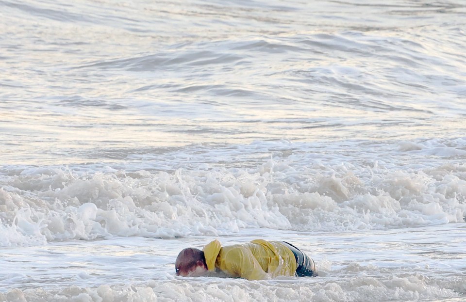 At one point Ed Sheeran was seen face down dipping into the sea and was soaked through