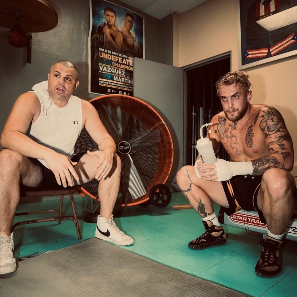 Boxing trainer BJ Flores with Jake Paul