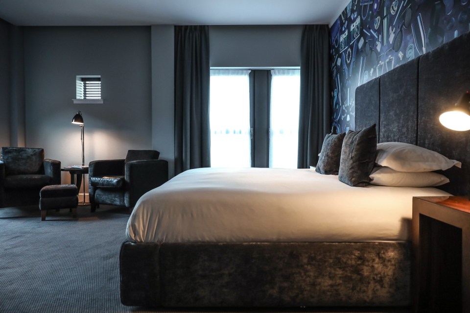The rooms have an urban, funky vibe, with slate-grey carpets and bright pop art