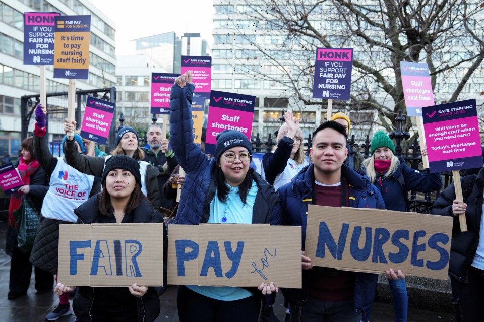 Striking NHS nurses outside St Thomas’ Hospital in London today