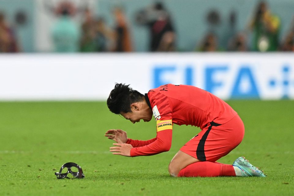 Son threw off his mask in an emotional celebration