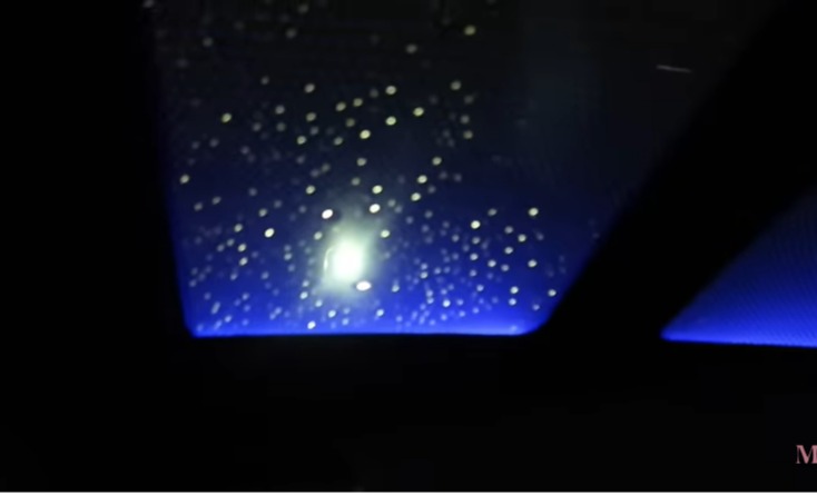 The car is decked out with roof star lights