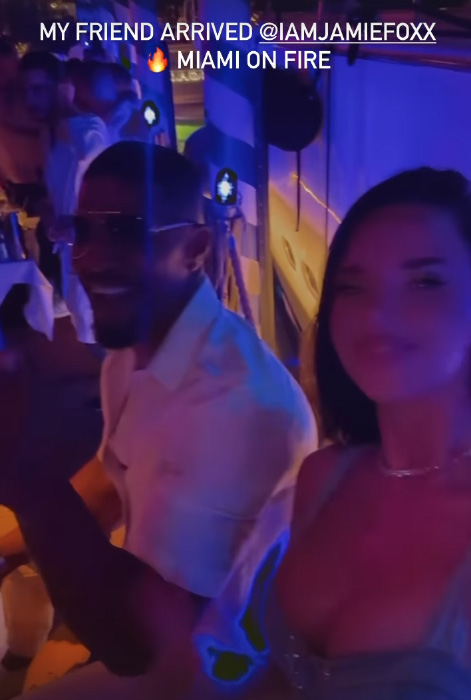 Foxx smiles for the camera as he enjoys a lively bash in Miami