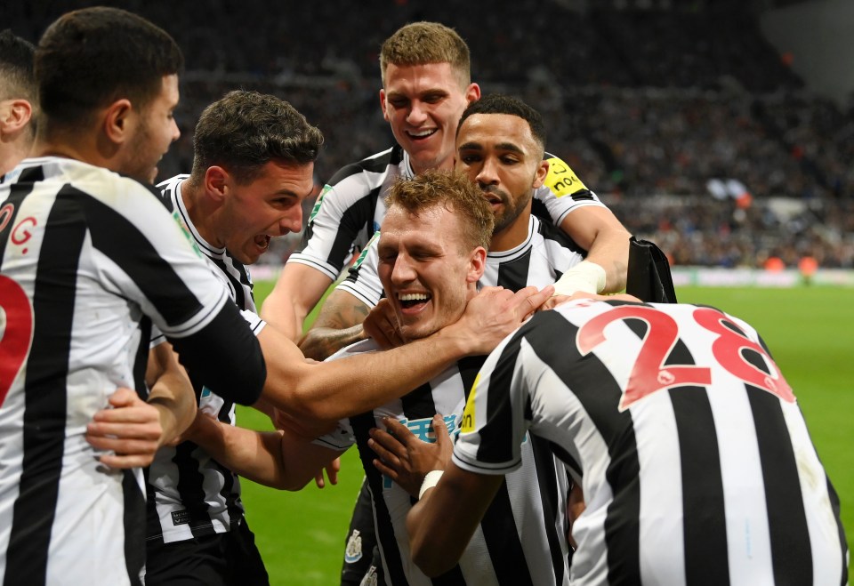 Dan Burn was mobbed by his team-mates after breaking the deadlock