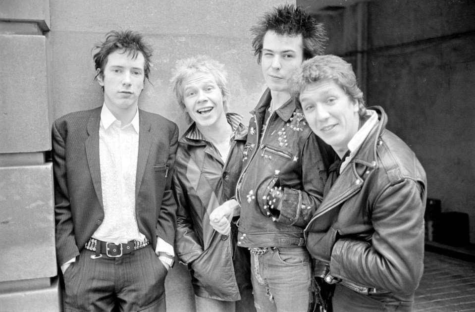 John, left, with fellow Sex Pistols Paul Cook, the late Sid Vicious and Steve Jones