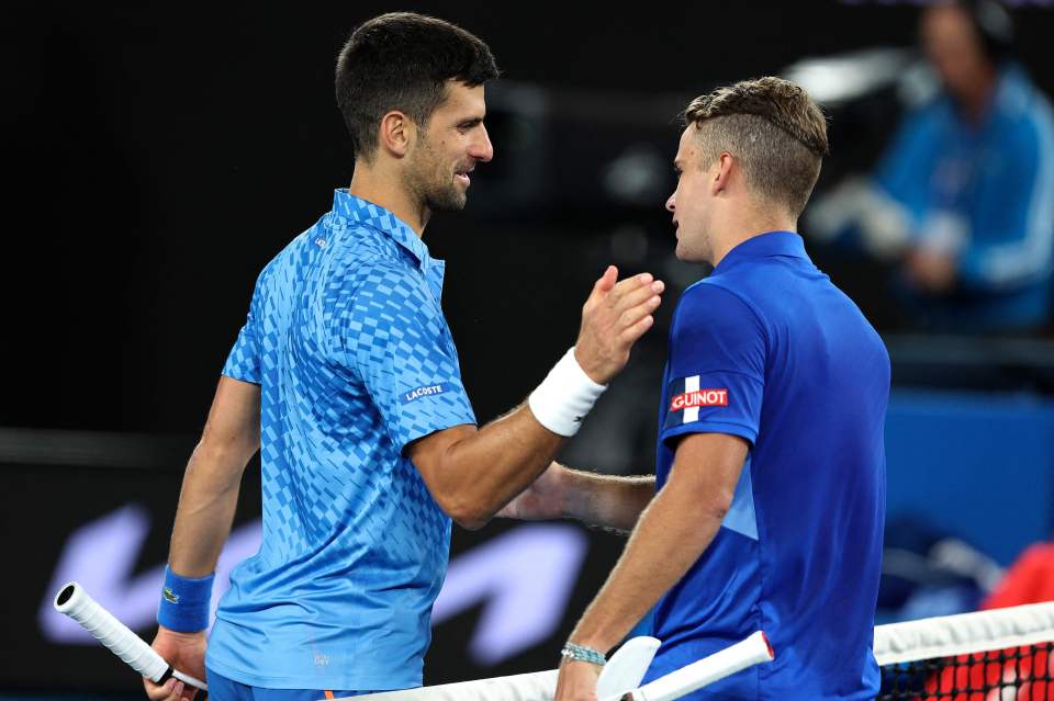 Djokovic shakes Enzo Couacaud's hand after beating him four sets