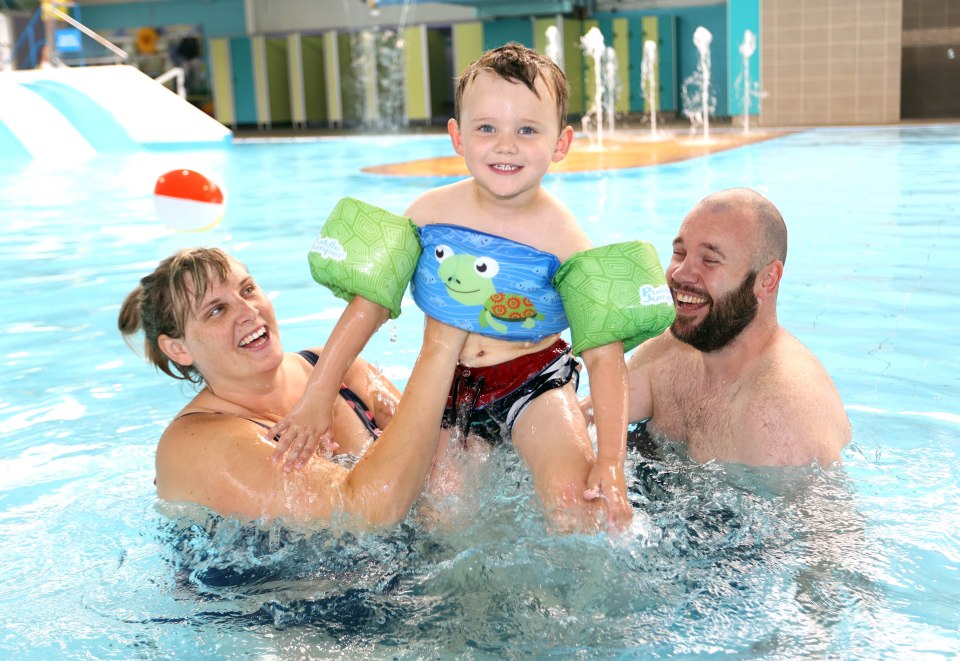 Julie, Joseph and Andrew having a splashing time