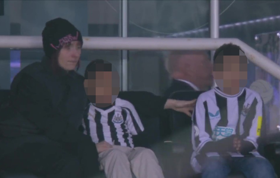 Christian Atsu's wife Marie-Claire Rupio sits with two of their three children