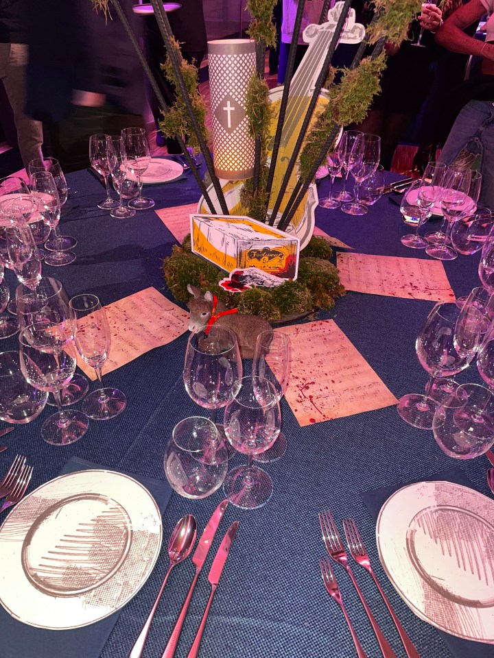 Blood soaked sheets of music and models of a donkey make up the table display inspired by The Banshee's Of Inisherin