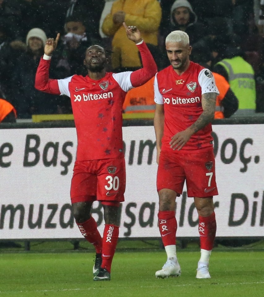 Atsu points to the sky after his goal
