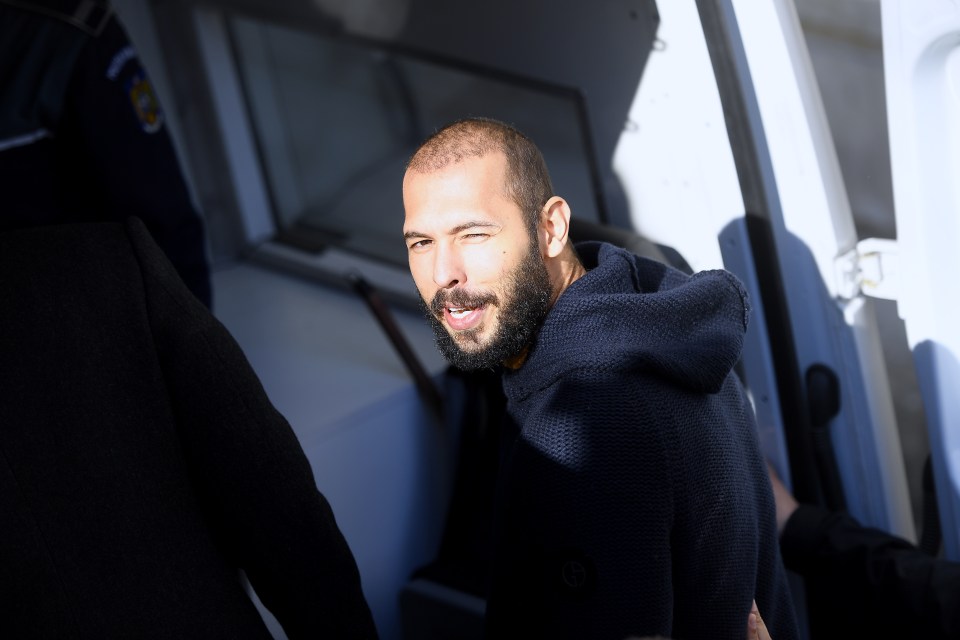 Andrew Tate pictured leaving court after a failed bid to be released on bail