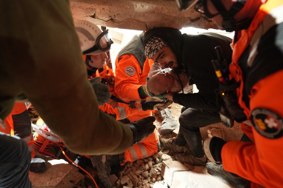 Rescuers work tirelessly to find survivors in the rubble