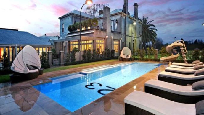 His former mansion had an enormous swimming pool