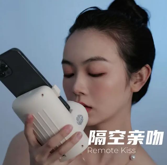 The device also has an in-app 'kissing square' where users can select a stranger to snog at random