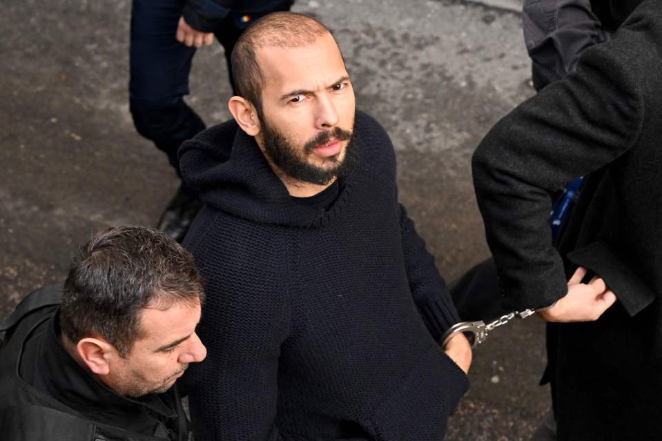 Tate pictured outside a court in Bucharest