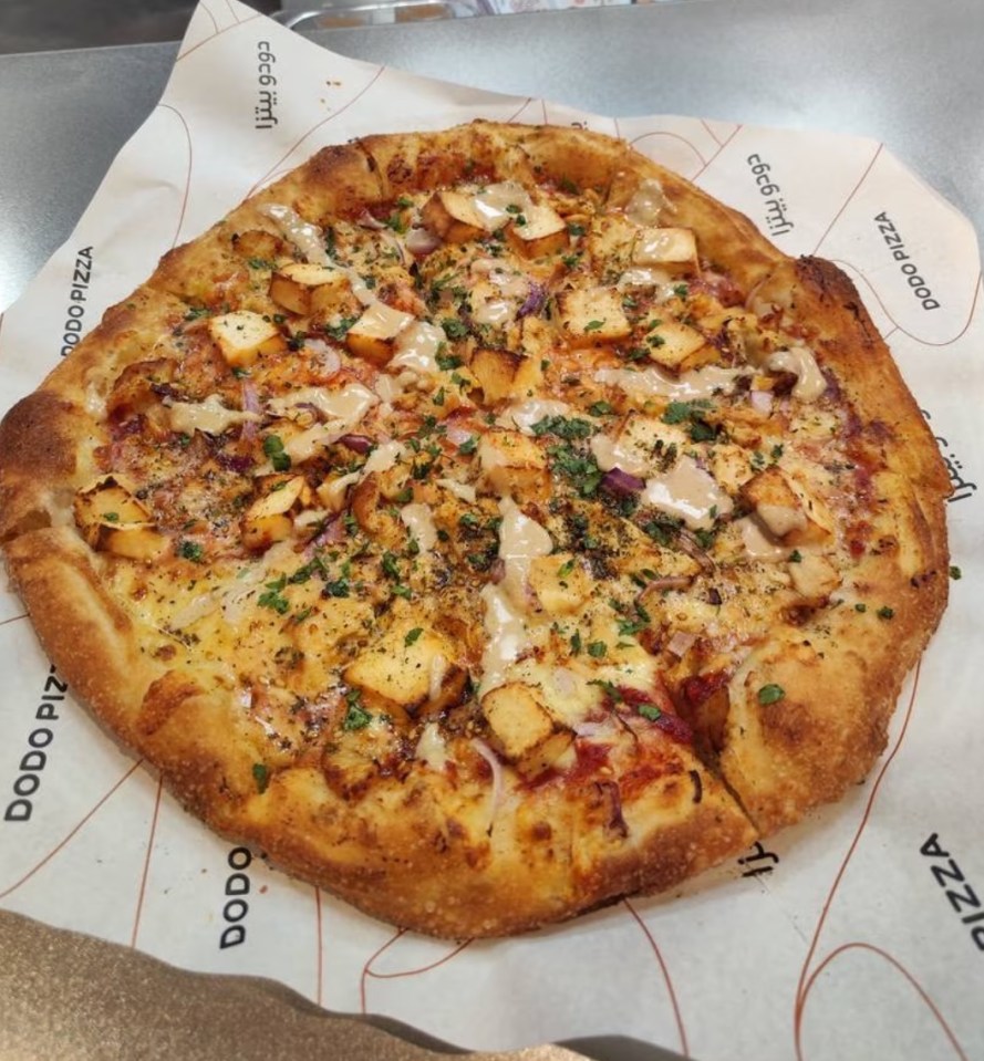 One of Dodo Pizza's latest creations is a tahini sauce and za'atar combination, recommended by ChatGPT
