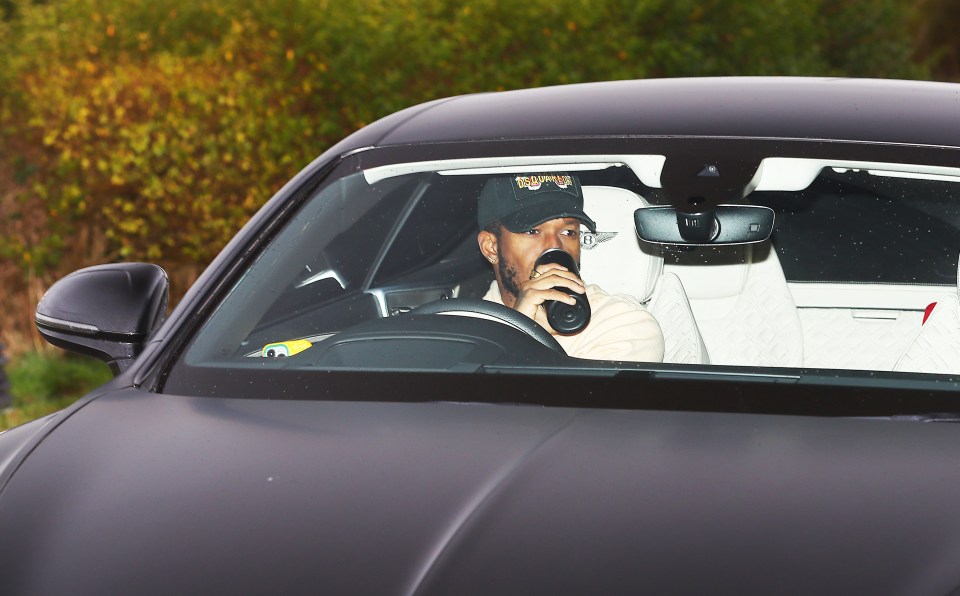 Fred, who started in midfield against Liverpool, took a sip of a drink on his way in