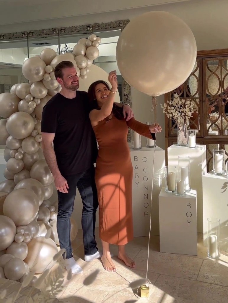 Montana Brown and boyfriend Mark O'Connor popped a balloon