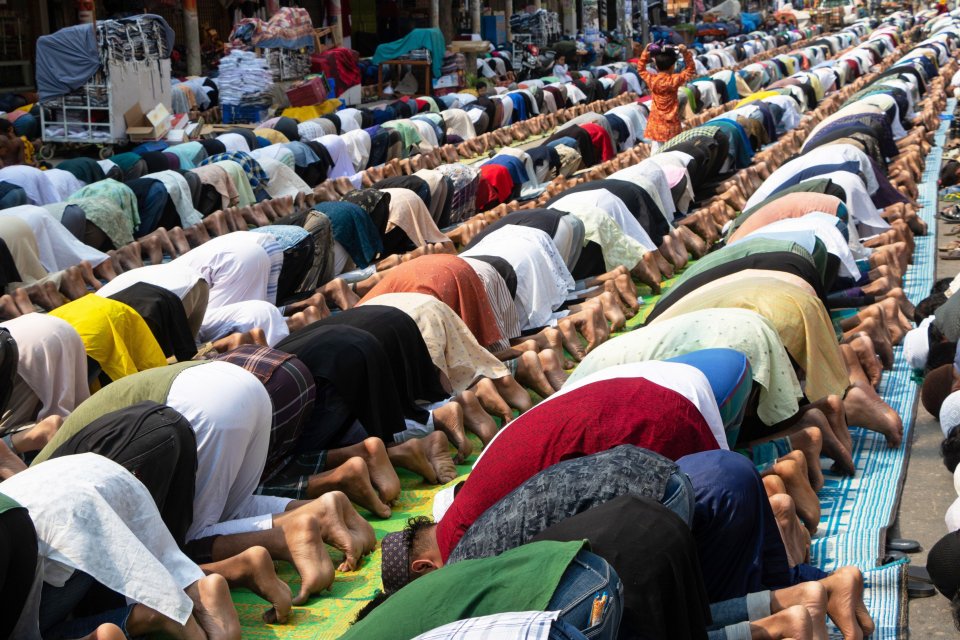 Alamy Live News. 2PGRGPA March 24, 2023, Narayanganj, Dhaka, Bangladesh: Muslim devotees kneel in the middle of a busy road junction to offer Jummah prayer on a street near a Mosque during the first day of the holy month of ramadan in Narayanganj, Bangladesh. Dedicated prayer grounds are not enough to handle this huge number of people, so large numbers of people come to the outside street area to pray. All the ground transportation and pedestrian crossings are suspended during that time. (Credit Image: ¿ Joy Saha/ZUMA Press Wire) EDITORIAL USAGE ONLY! Not for Commercial USAGE! This is an Alamy Live News image and may not be part of your current Alamy deal . If you are unsure, please contact our sales team to check.