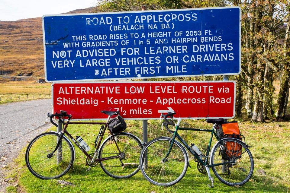 Signs warn visitors of the dangers of the treacherous road