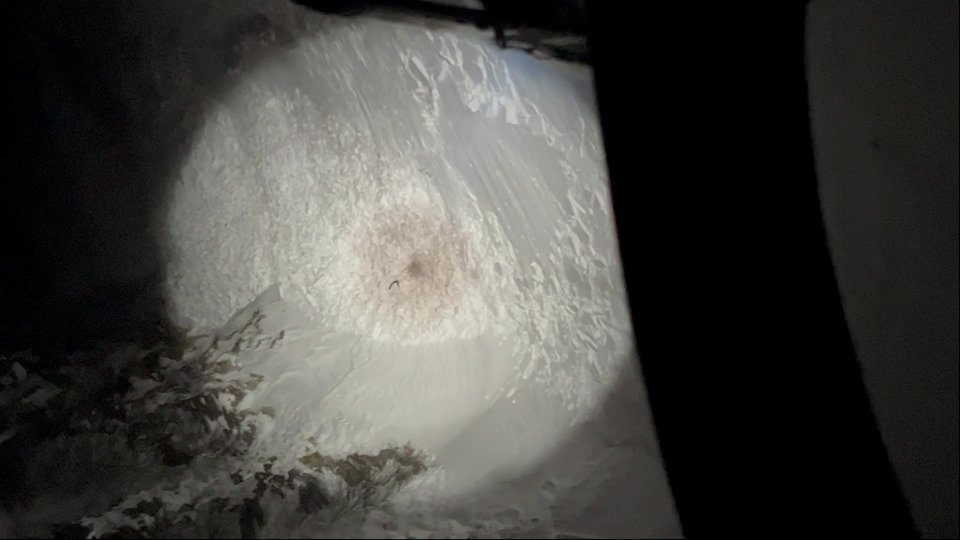 Footage captured from the helicopter when the rescue team spotted the missing hiker