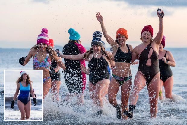 Swimmers mark International Women's Day with a freezing dip in the sea