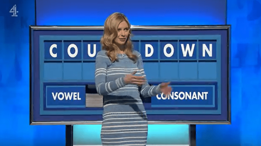 Rachel wore a pale blue and white striped dress