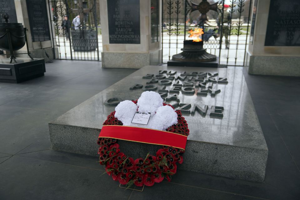 The Prince placed the touching tribute at the foot of the monument