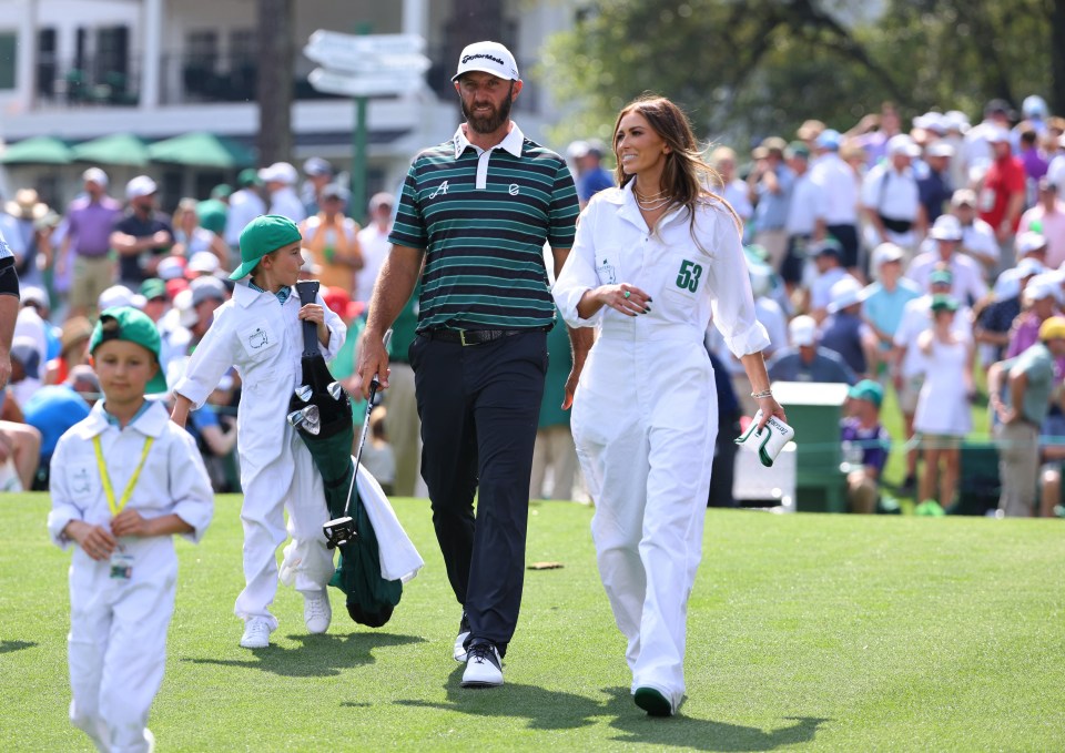 Paulina Gretzky turned caddy for her husband at the Masters on Wednesday