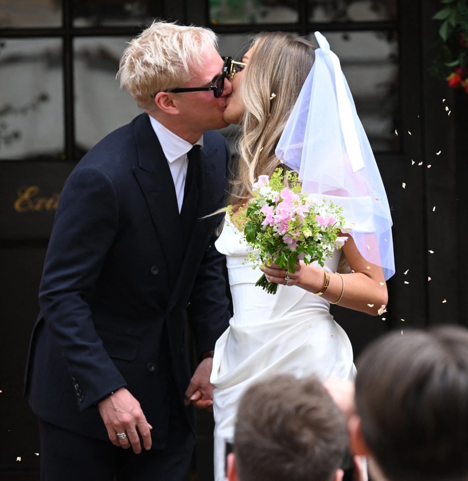 The pair kissed in front of pals at the registry office on the King's Road