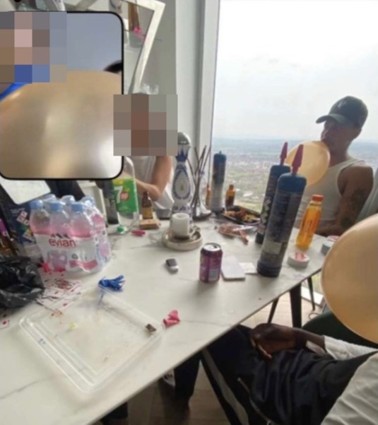 Dele Alli was snapped with a balloon in his mouth, surrounded by gas canisters