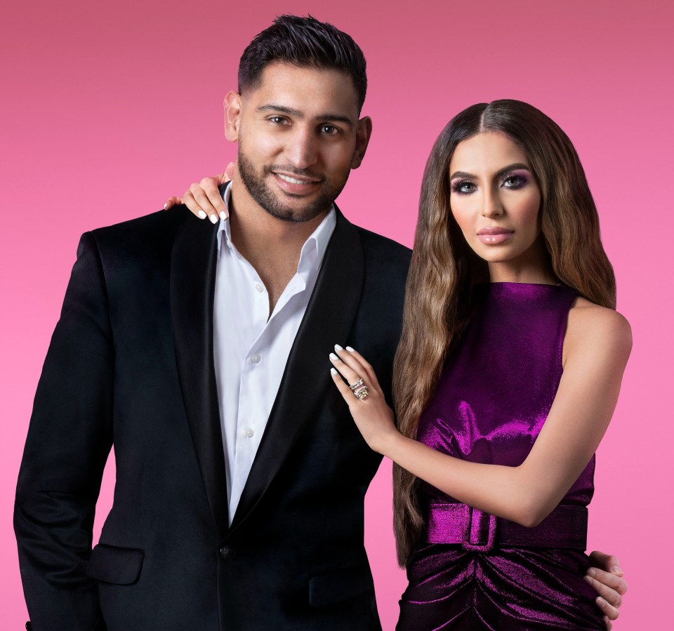 Amir Khan, pictured with wife Faryal, has been banned from boxing for two years