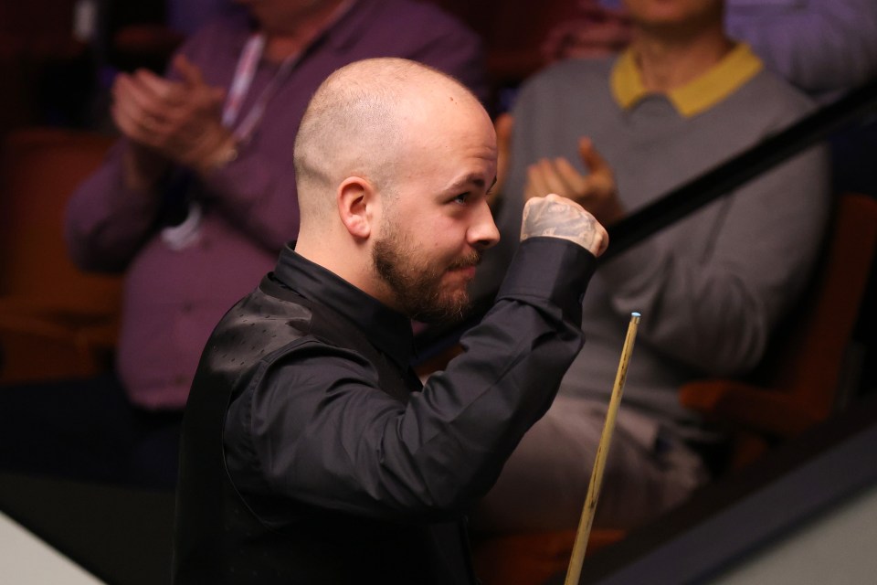 Luca Brecel  celebrates his shock win