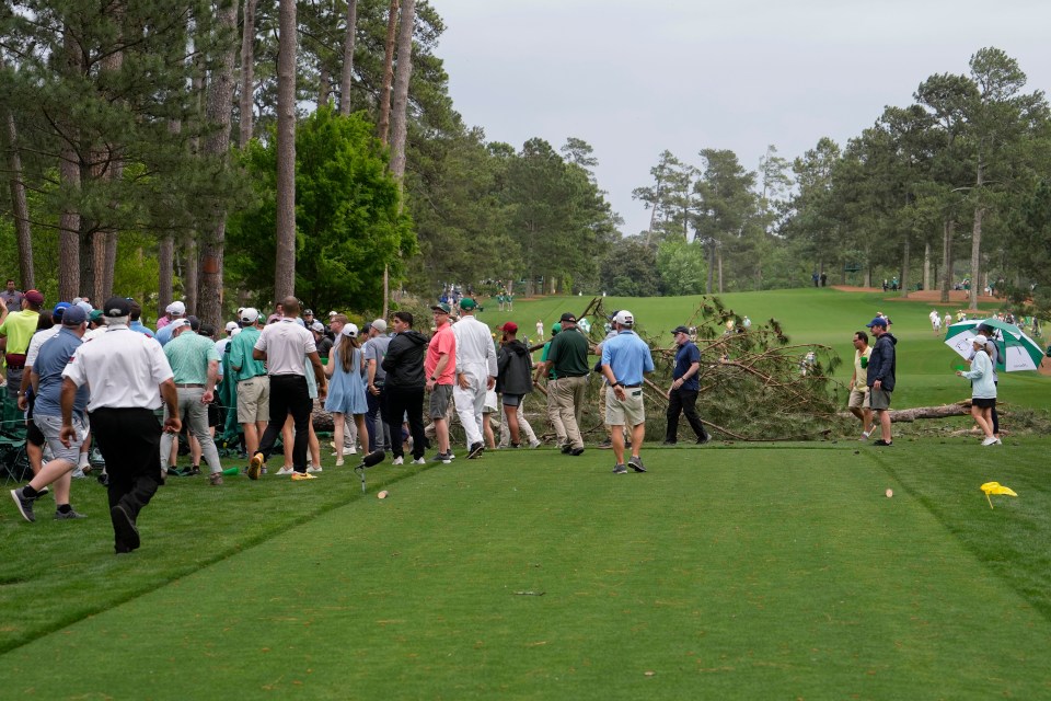 Spectators joined the clear-up effort at hole 17